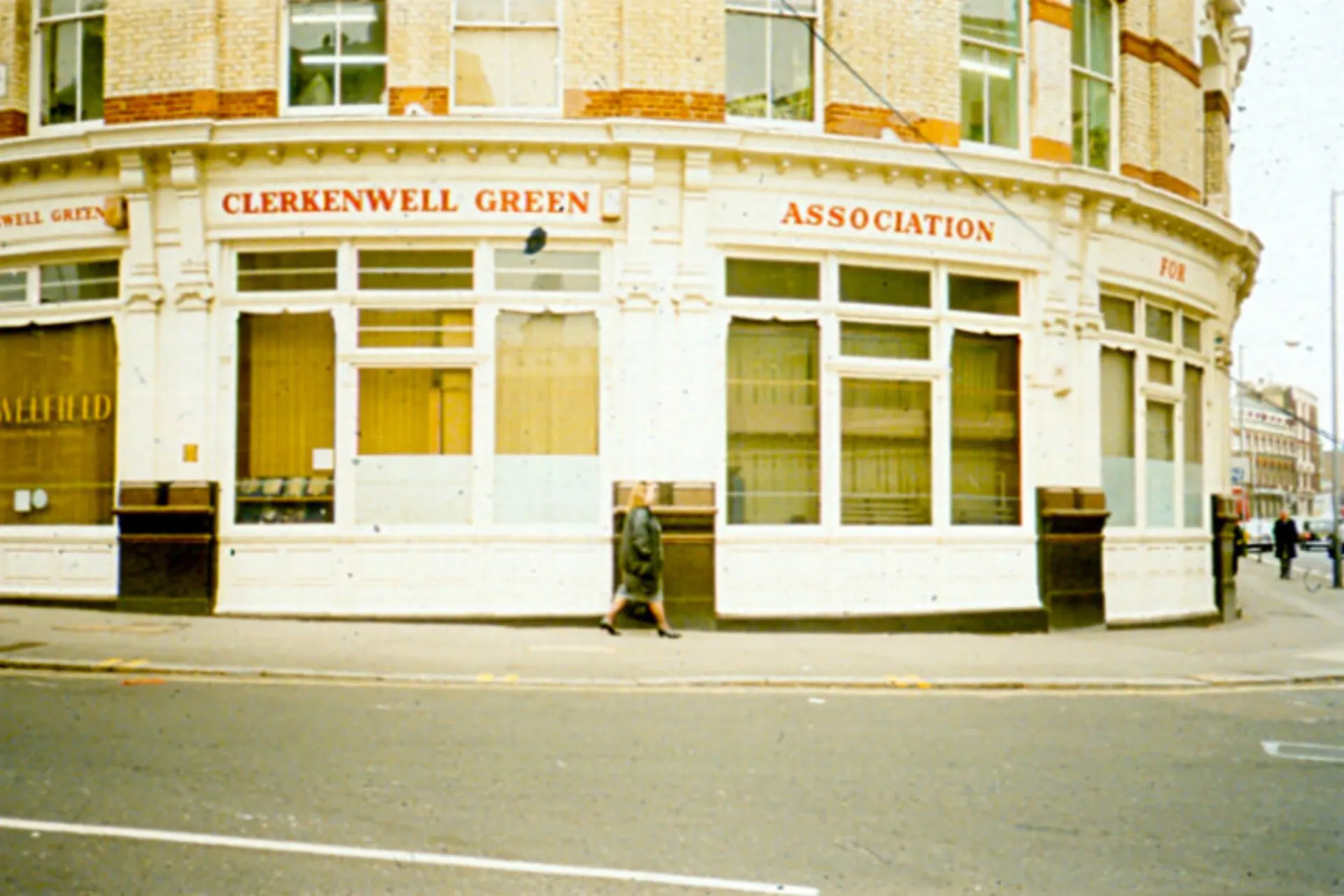 Archive image of the ground floor facade of Cornwell House with the writing "Clerkenwell Green Association" written above the windows.