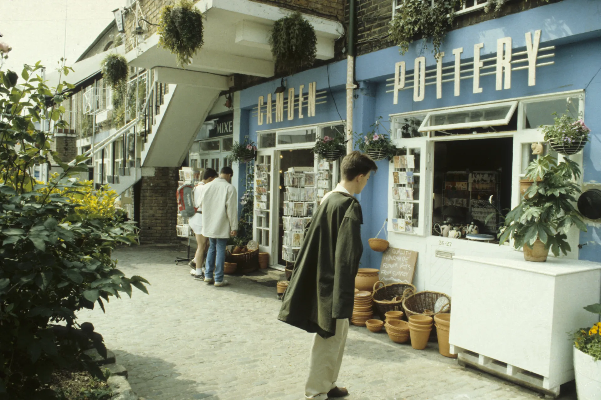 People browse the shops at Camden Market