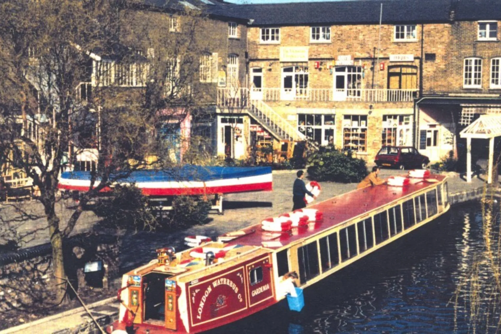 Archive image showing a narrowboat with London Waterbus Co painted on the side