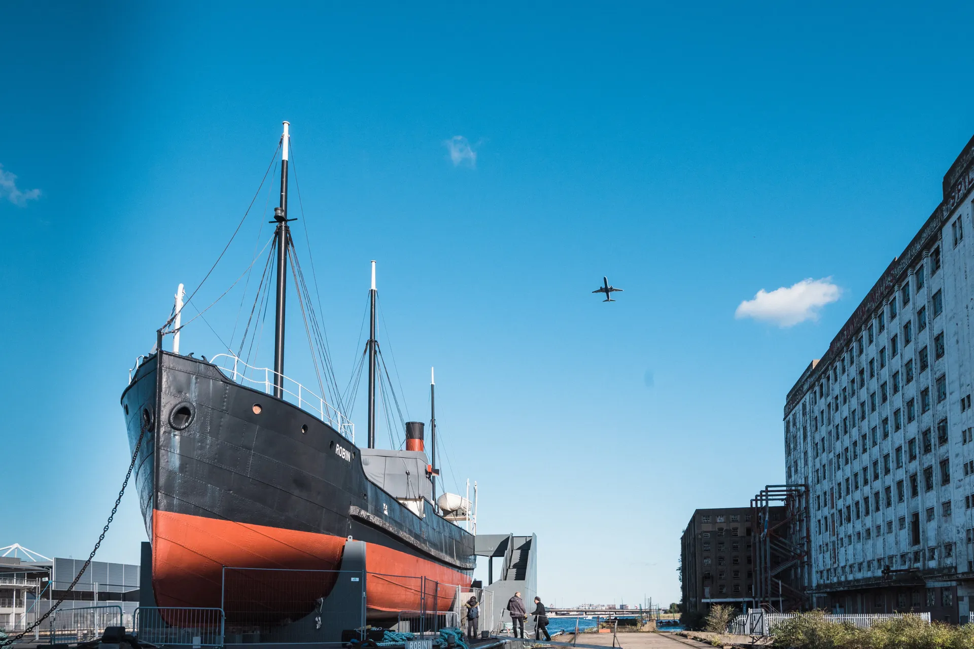 Red ship against blue sky