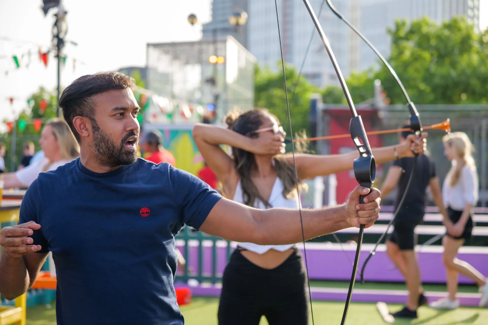 people playing archery